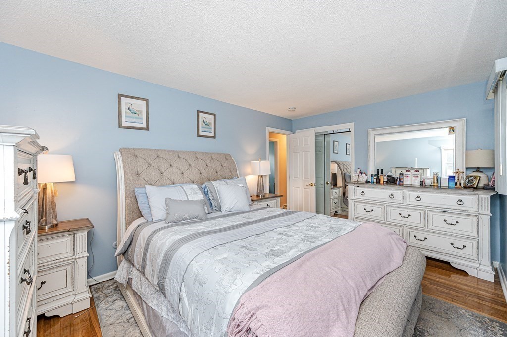 2 Lorenzo Road Lawrence, MA 01843 - Photo 25 of 42 a bedroom with a bed and a large mirror