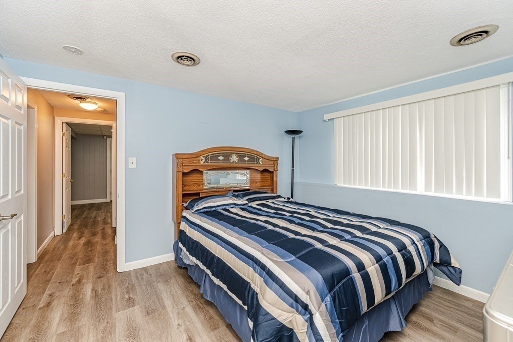 2 Lorenzo Road Lawrence, MA 01843 - Photo 26 of 42 a bedroom with a bed and a window
