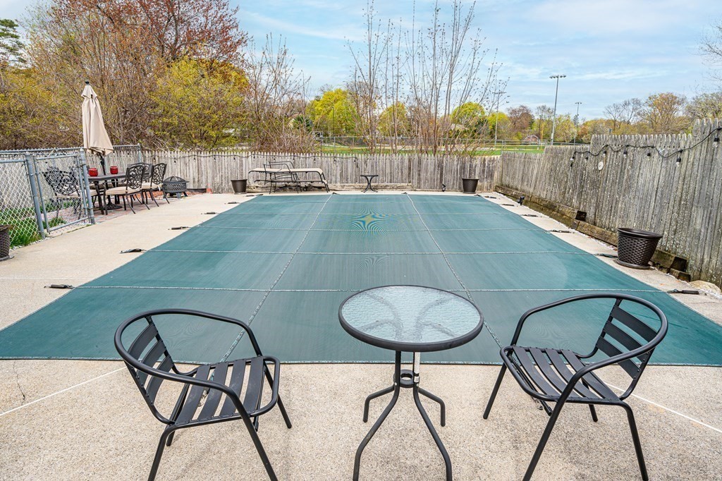 2 Lorenzo Road Lawrence, MA 01843 - Photo 35 of 42 a view of a chairs and table in patio