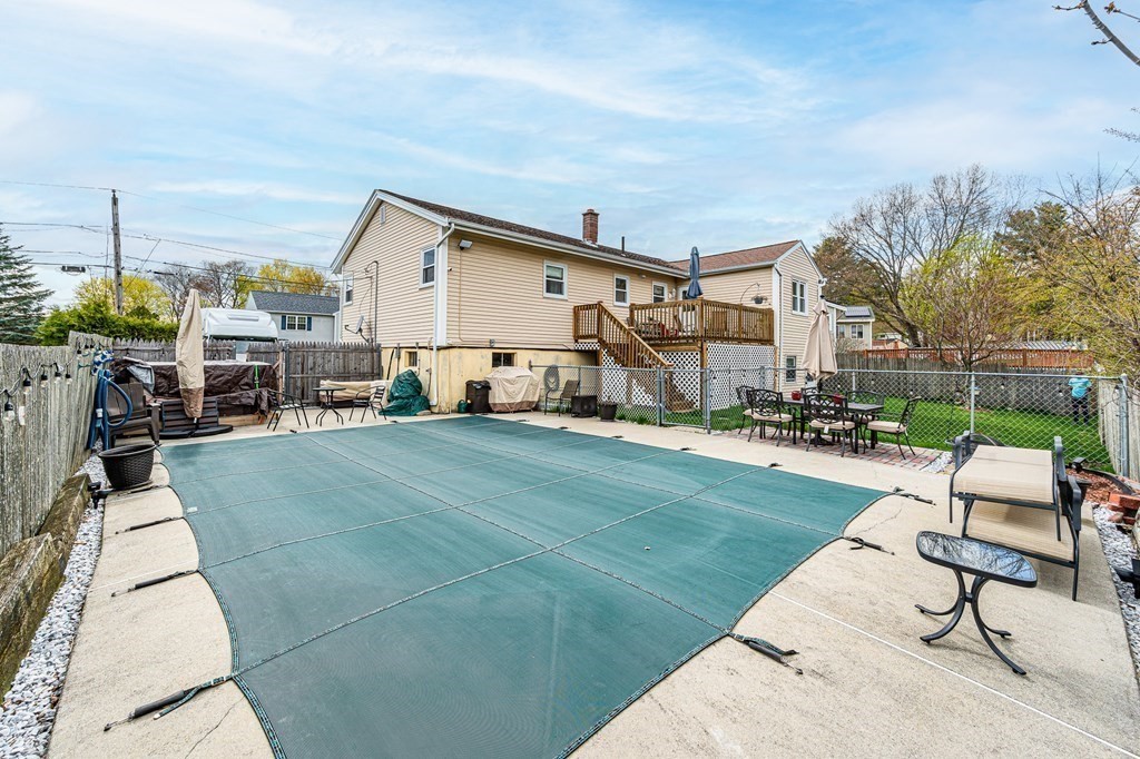 2 Lorenzo Road Lawrence, MA 01843 - Photo 36 of 42 a backyard of a house with table and chairs