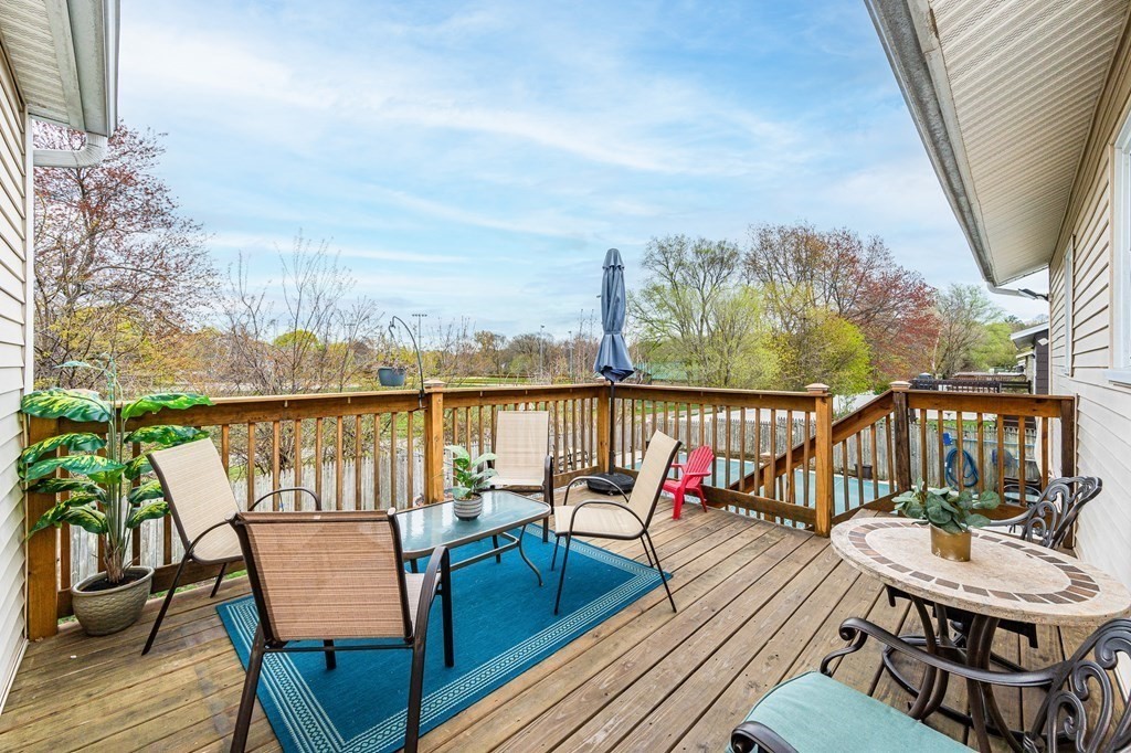 2 Lorenzo Road Lawrence, MA 01843 - Photo 38 of 42 a view of a balcony with wooden floor and outdoor seating