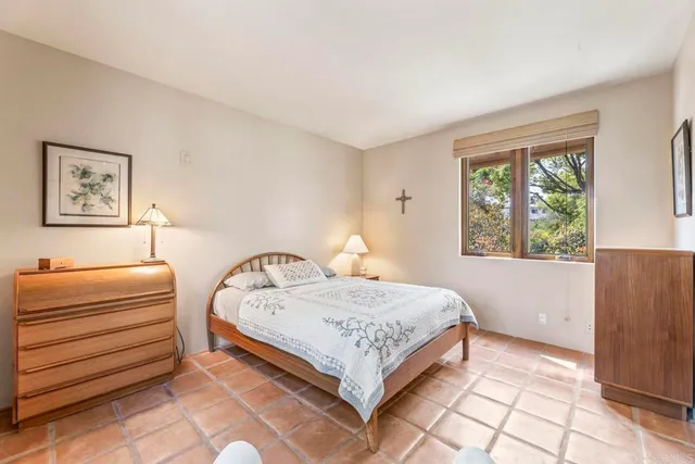 a kitchen with a sink dishwasher and cabinets