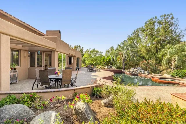 a view of a city with mountains in the background