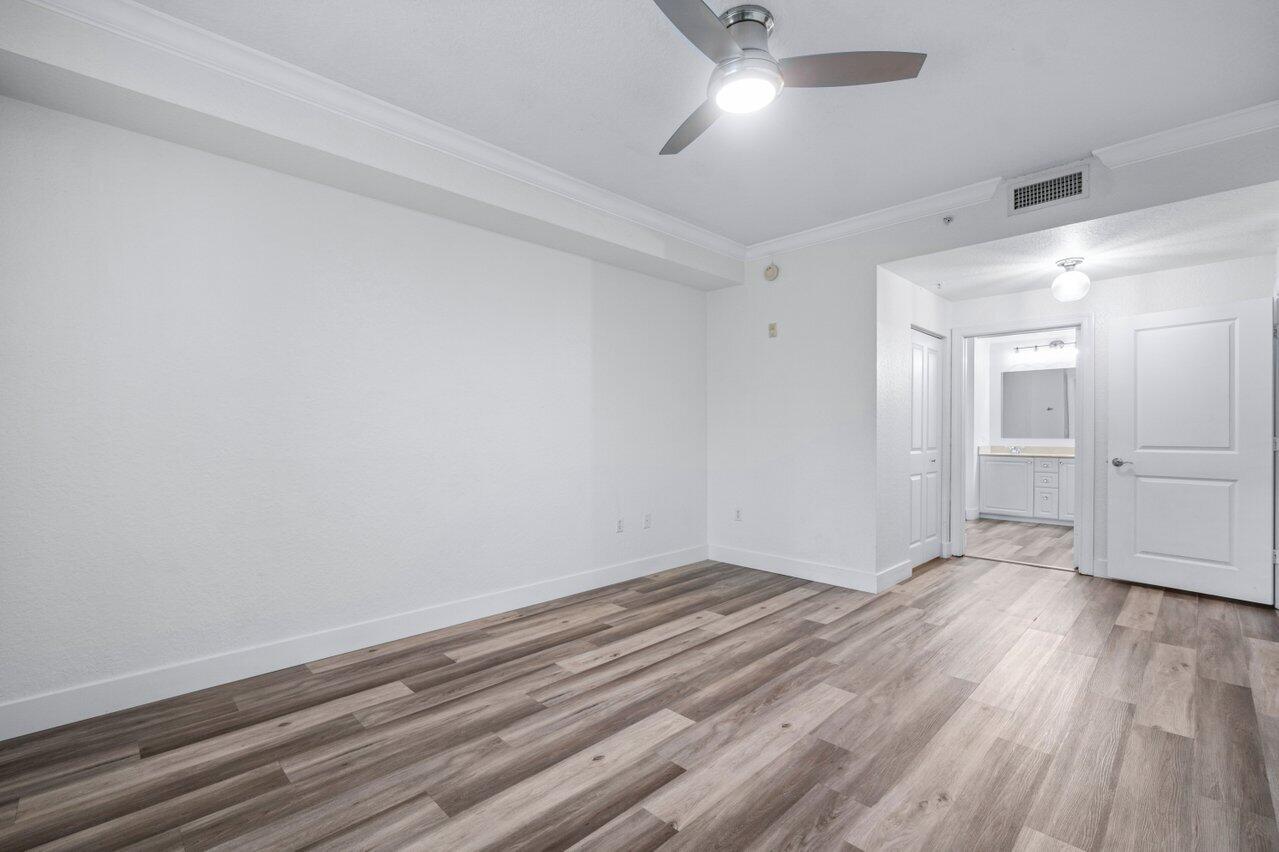 1117 Renaissance Way, Unit 117 Boynton Beach, FL 33426 - Photo 23 of 31 wooden floor in an empty room