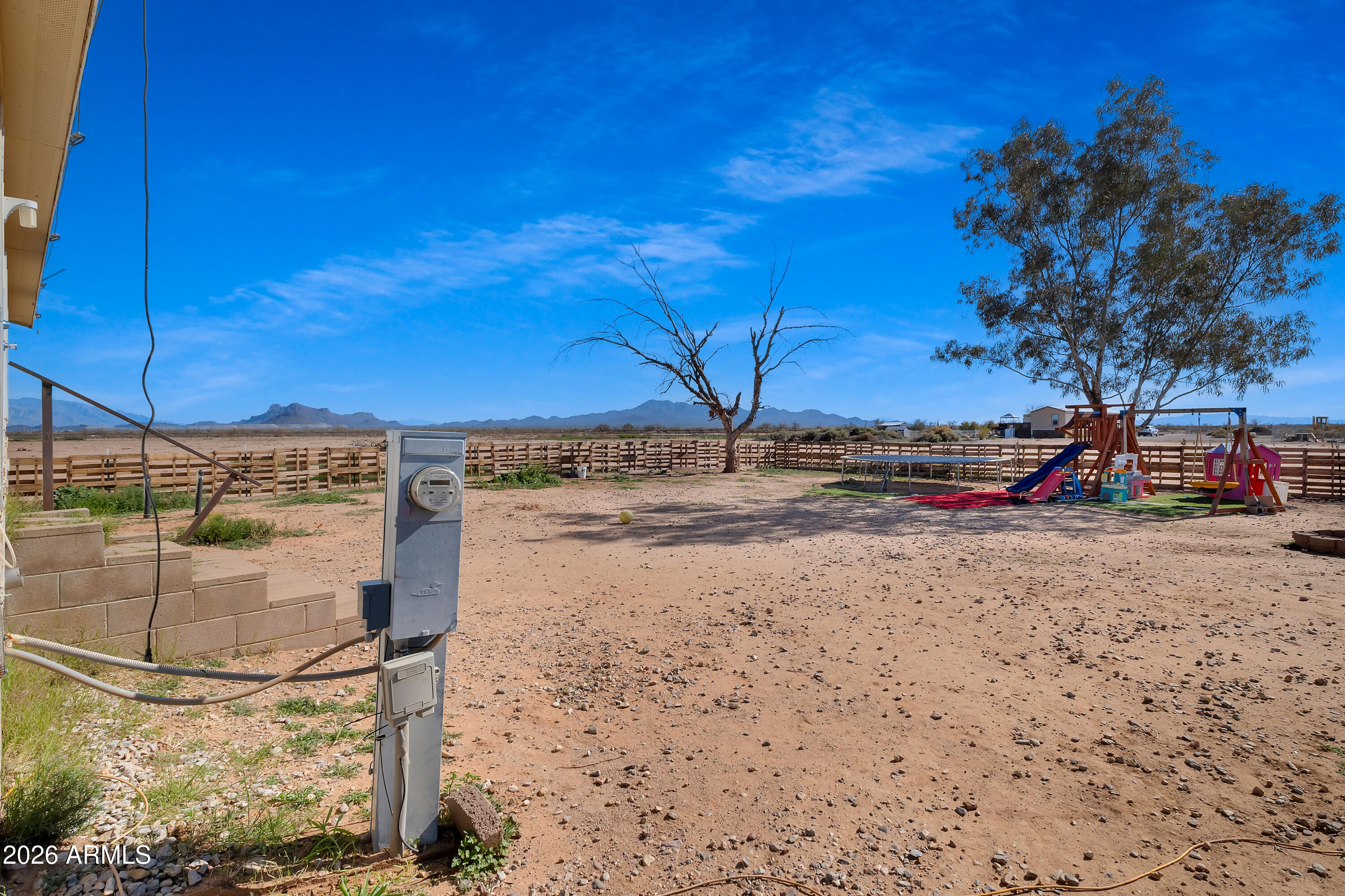 8902 Ghost Ranch Road Marana, AZ 85653 - Photo 25 of 28 a view of a road with a snow on the road