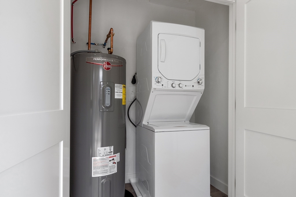 631 Franklin Street, Unit 106 Worcester, MA 01604 - Photo 19 of 36 a utility room with dryer and washer