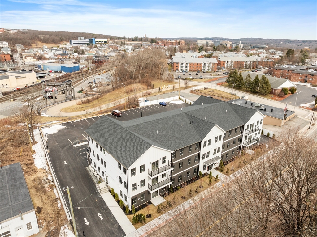 631 Franklin Street, Unit 106 Worcester, MA 01604 - Photo 21 of 36 an aerial view of residential houses with city view