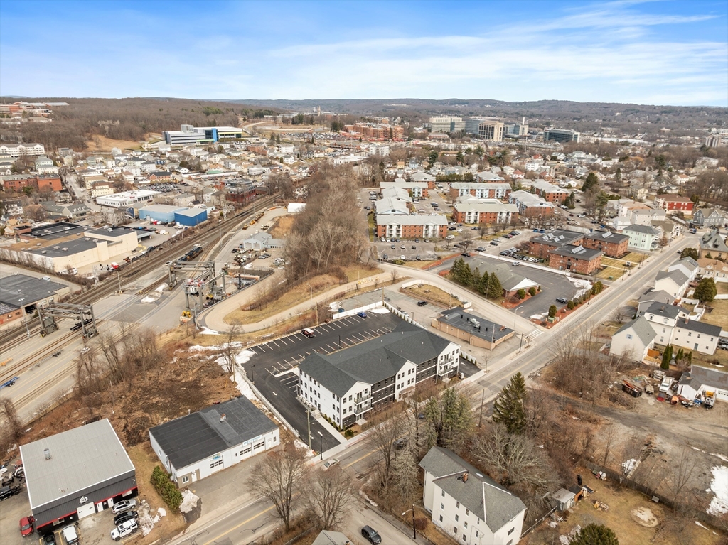 631 Franklin Street, Unit 106 Worcester, MA 01604 - Photo 36 of 36 an aerial view of residential building with parking