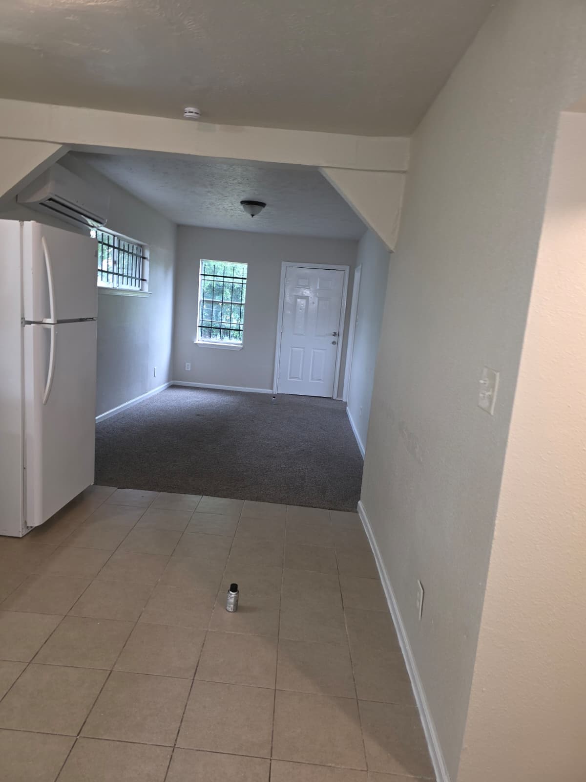 242 Bolden Street Houston, TX 77029 - Photo 14 of 24 a bedroom with a bed and a window