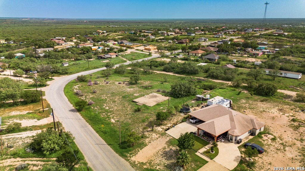 1326 Wagon Wheel Road Eagle Pass, TX 78852 - Photo 3 of 17 an aerial view of residential houses with outdoor space