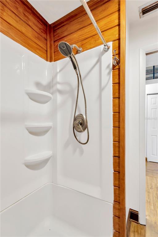 8014 Peach Drive Temple Terrace, FL 33637 - Photo 23 of 31 a bathroom with a shower