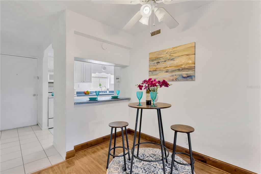8014 Peach Drive Temple Terrace, FL 33637 - Photo 8 of 31 a dining room with furniture and window