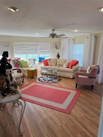 a kitchen with stainless steel appliances refrigerator stove microwave and cabinets