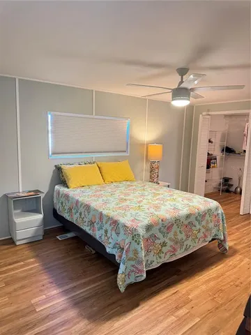 a bathroom with a toilet sink shower and mirror