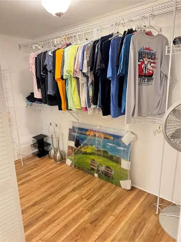 a bathroom with a granite countertop sink and mirror