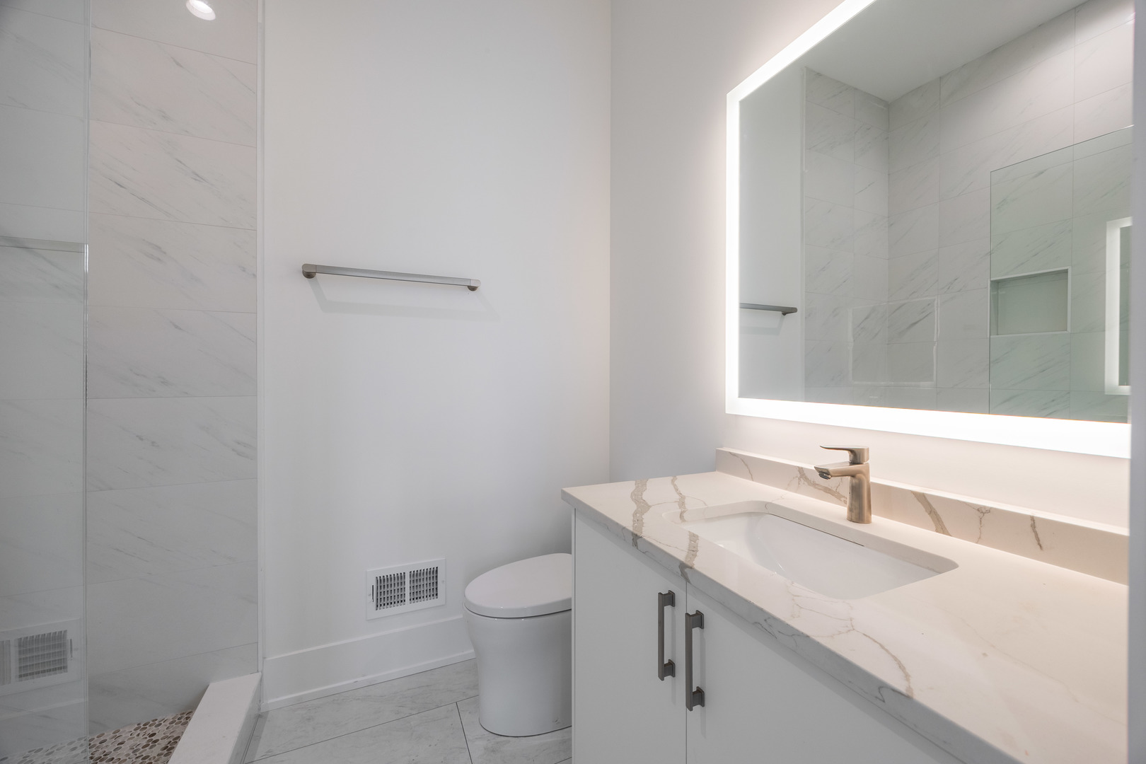 1814 West Thomas Street, Unit 1R Chicago, IL 60622 - Photo 17 of 26 a bathroom with a sink toilet and vanity