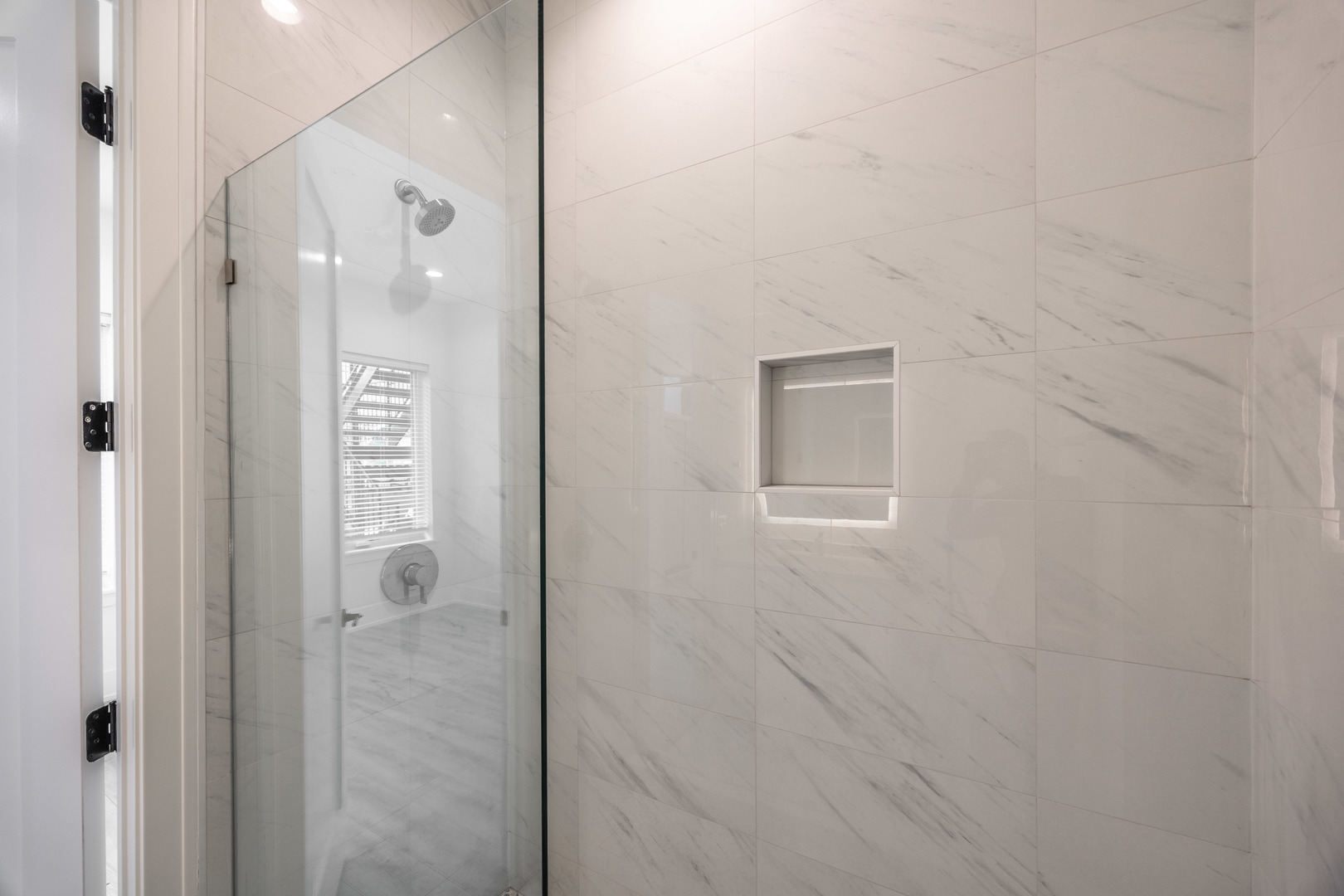 1814 West Thomas Street, Unit 1R Chicago, IL 60622 - Photo 20 of 26 a bathroom with a glass shower door