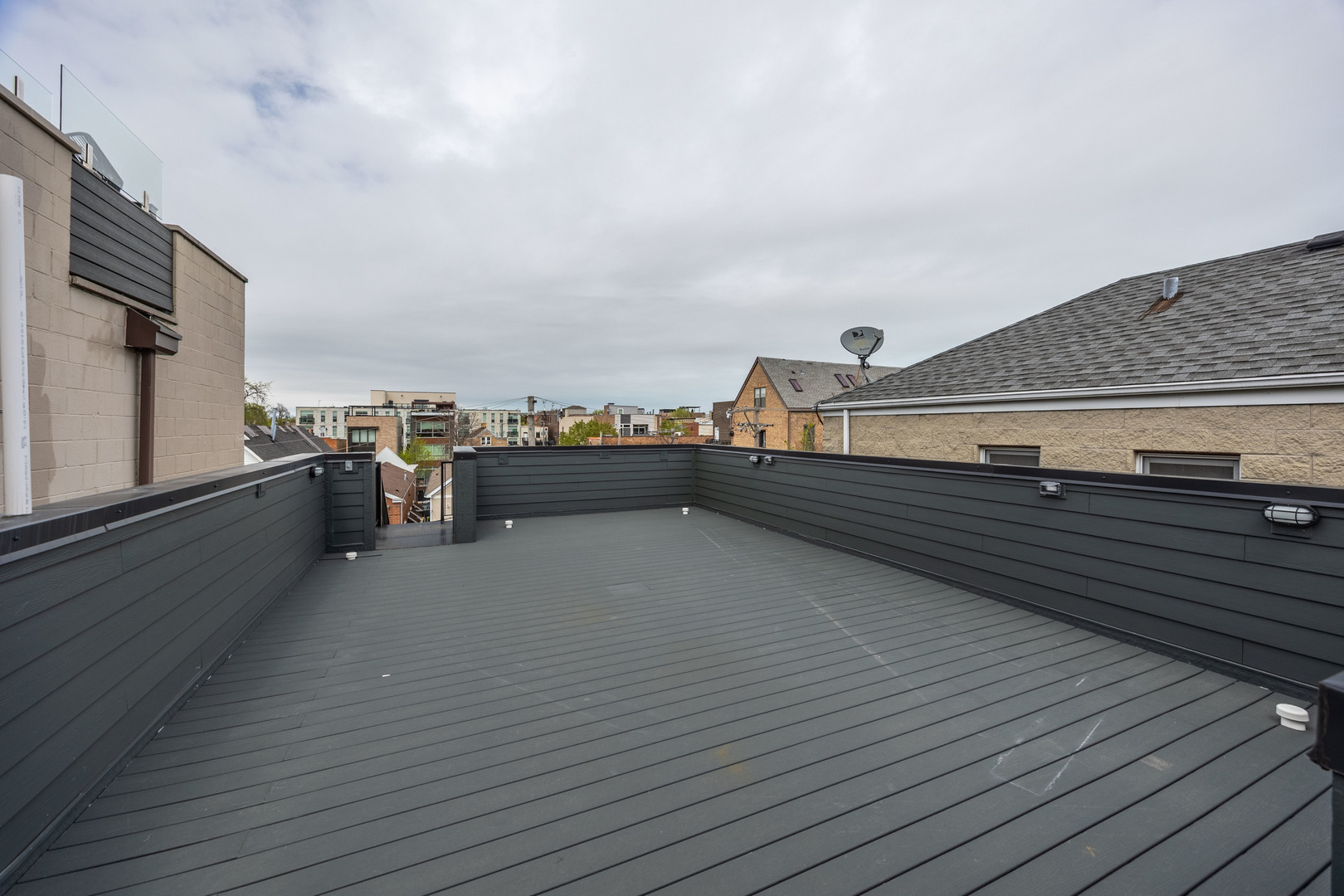 1814 West Thomas Street, Unit 1R Chicago, IL 60622 - Photo 22 of 26 a view of outdoor space with deck and flat screen tv