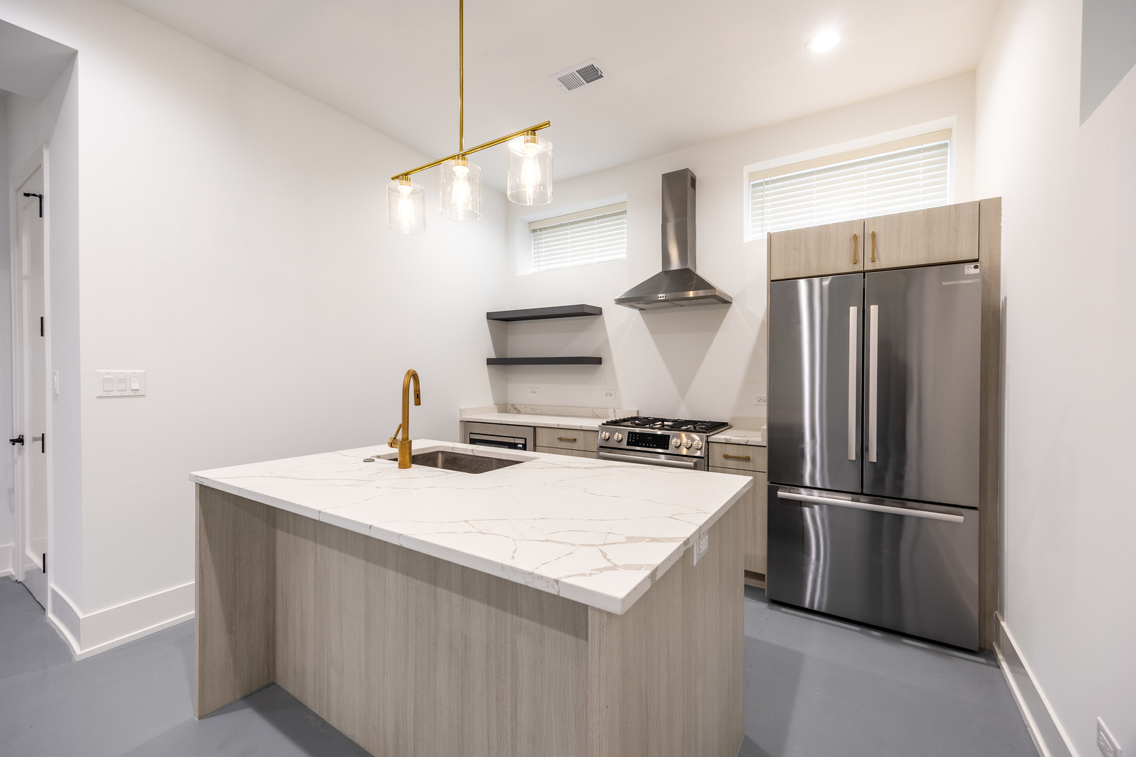 1814 West Thomas Street, Unit 1R Chicago, IL 60622 - Photo 3 of 26 a kitchen with stainless steel appliances a refrigerator and a sink