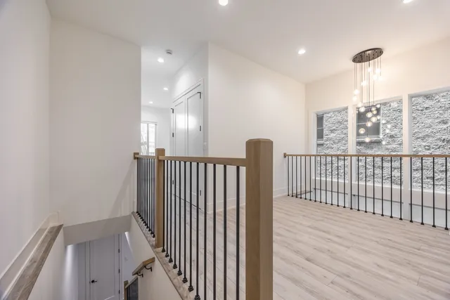a view of entryway with wooden floor