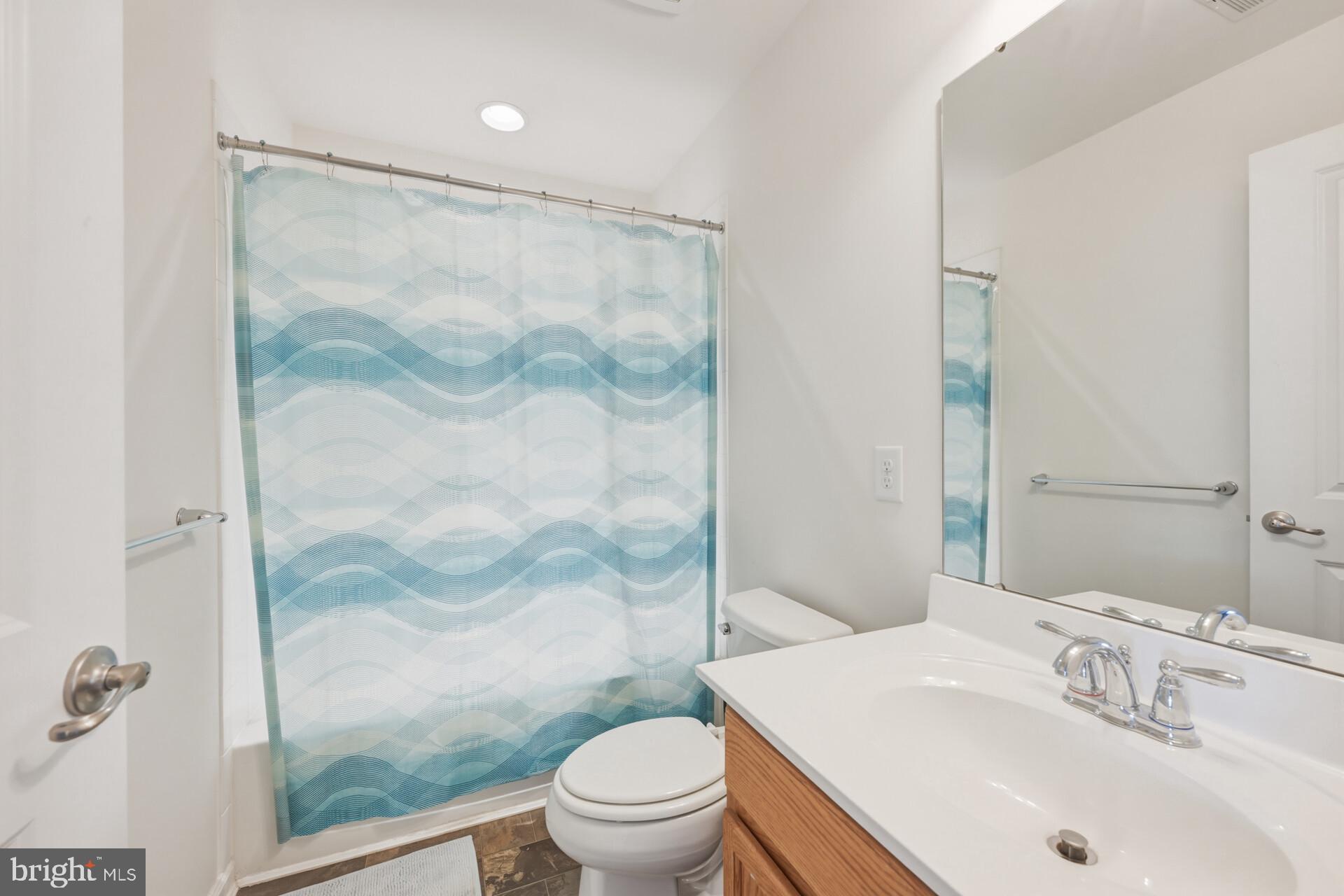 325 Schmidt Road Phoenixville, PA 19460 - Photo 18 of 27 a bathroom with a sink and a mirror