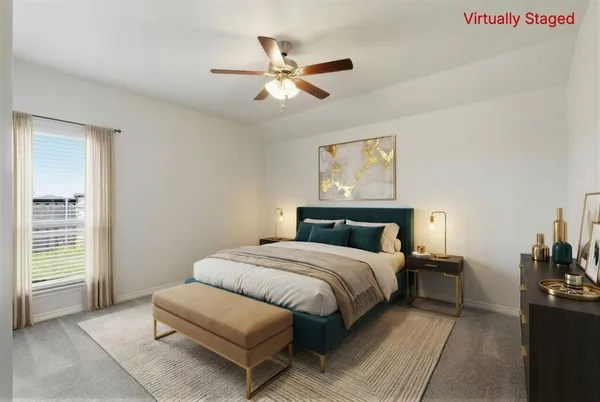 an empty room with window and ceiling fan