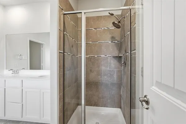 a white bath tub sitting next to a window