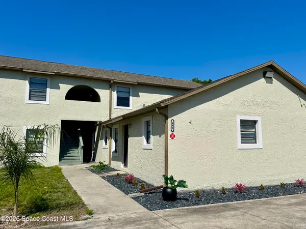 a kitchen with stainless steel appliances granite countertop a stove top oven a sink and dishwasher