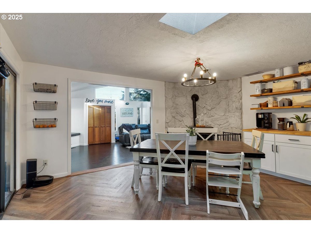 1855 Pilgrim Street Southeast Salem, OR 97302 - Photo 16 of 48 a view of a dining room with furniture and wooden floor
