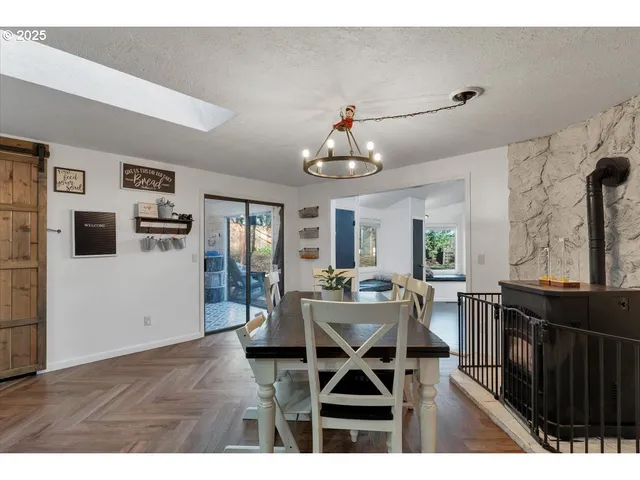 a living room with furniture and flat screen tv
