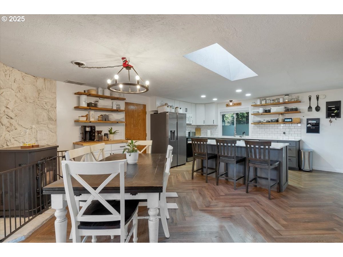 1855 Pilgrim Street Southeast Salem, OR 97302 - Photo 18 of 48 a dining room with furniture and wooden floor
