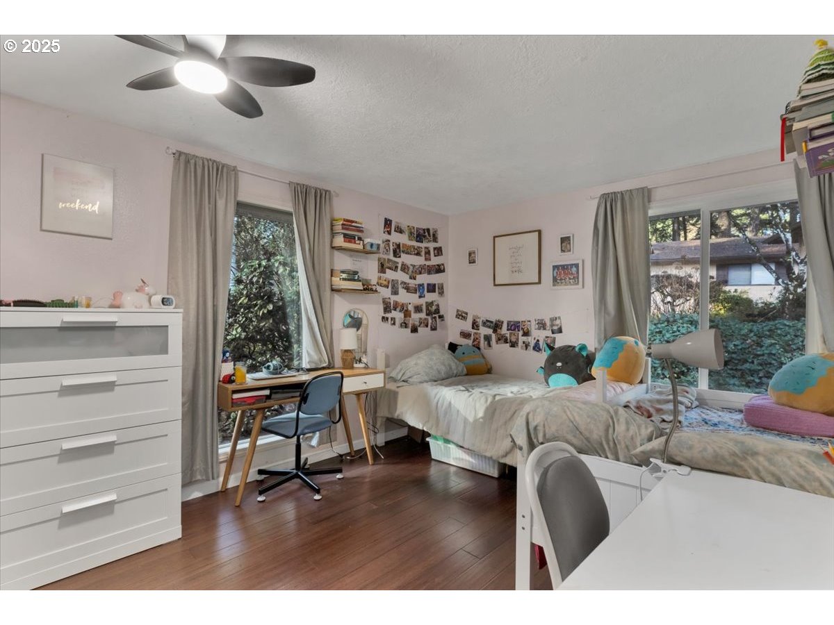 1855 Pilgrim Street Southeast Salem, OR 97302 - Photo 27 of 48 a bedroom with a bed and wooden floor