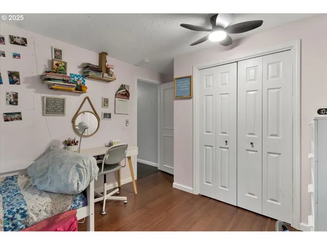 a very nice looking room with wooden floor