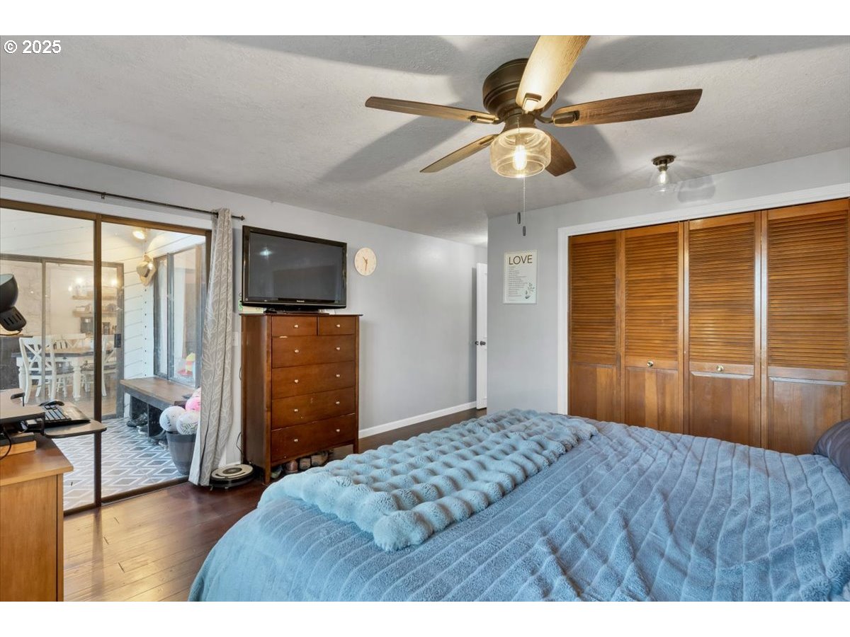 1855 Pilgrim Street Southeast Salem, OR 97302 - Photo 36 of 48 a bedroom with a bed and a flat screen tv