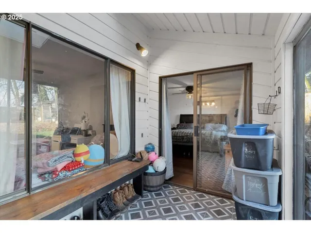 a living room with furniture and a table