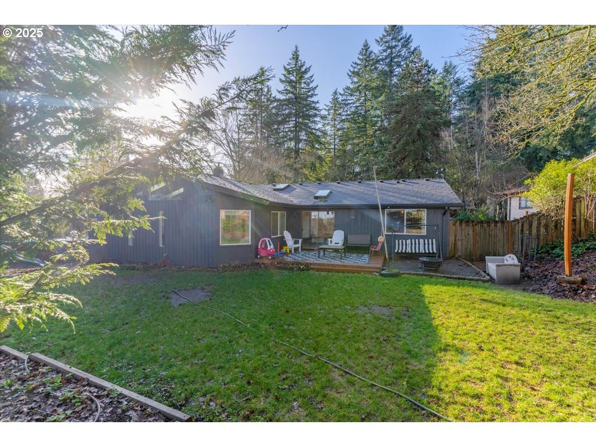 1855 Pilgrim Street Southeast Salem, OR 97302 - Photo 42 of 48 a view of a house with backyard and sitting area