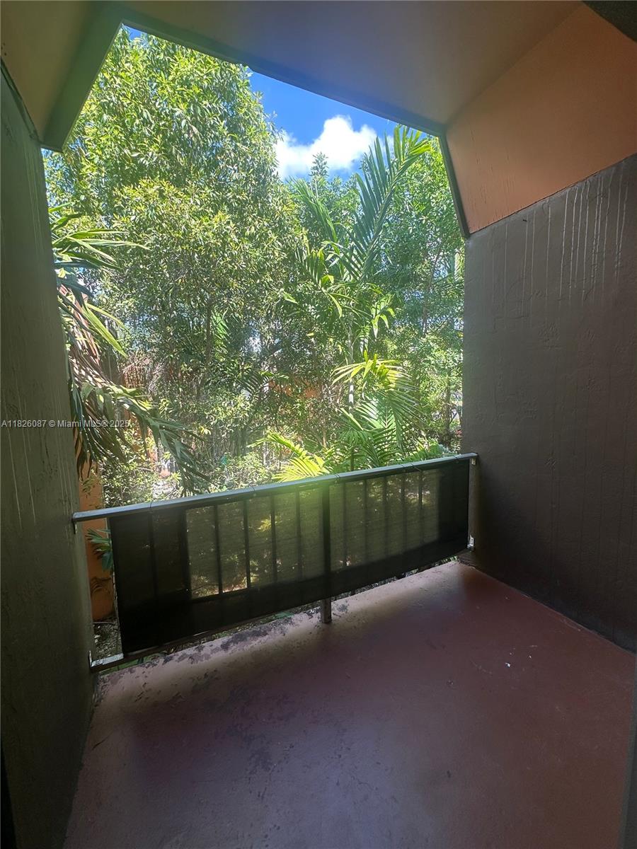9487 Southwest 76th Street, Unit M8 Miami, FL 33173 - Photo 3 of 16 a view of balcony