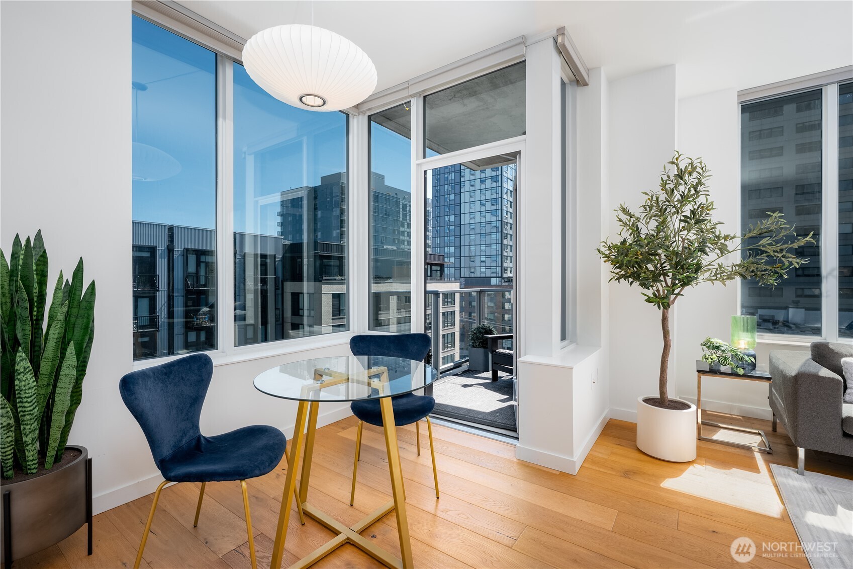 1321 Seneca Street, Unit 703 Seattle, WA 98101 - Photo 13 of 40 a living room with furniture and a large window