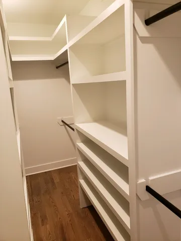 a view of an empty walk in closet