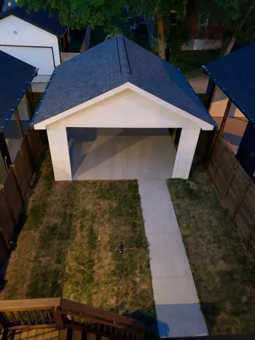 a backyard of a house with lots of green space