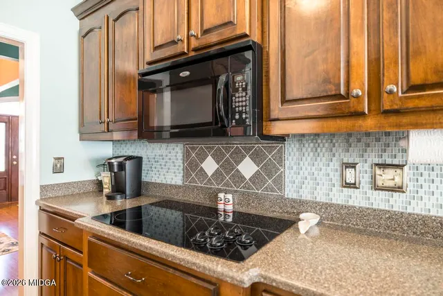 a picture of a bathroom with a door and a bathroom