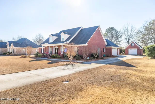 a front view of a house with outdoor space