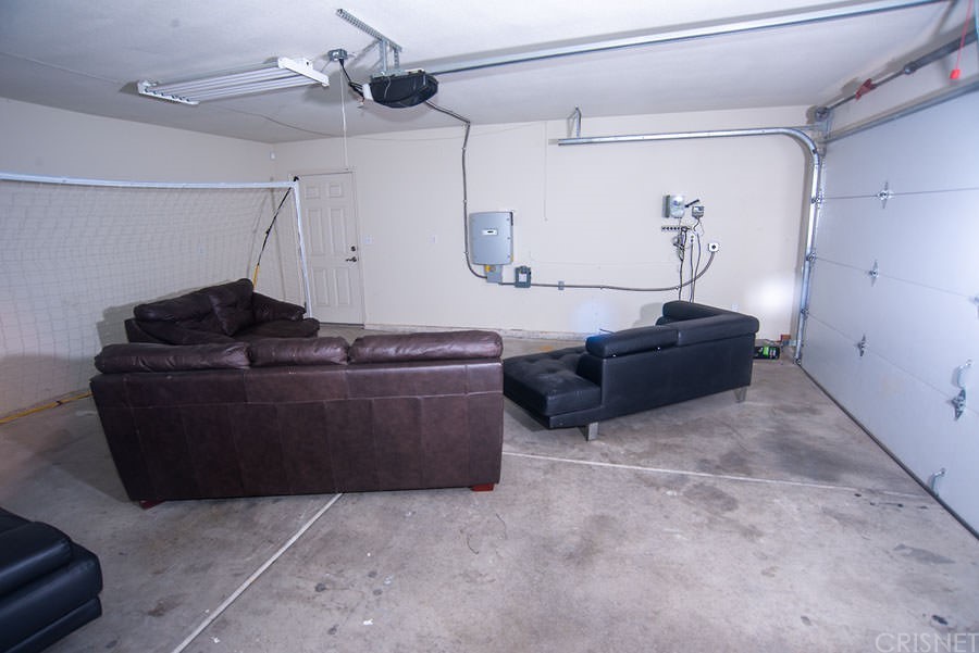 28454 Santa Rosa Road Lucerne Valley, CA 92356 - Photo 30 of 53 a living room with furniture and a ceiling fan