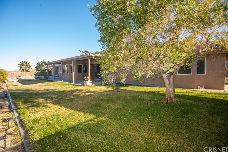 28454 Santa Rosa Road Lucerne Valley, CA 92356 - Photo 38 of 53 a view of house with swimming pool and a yard