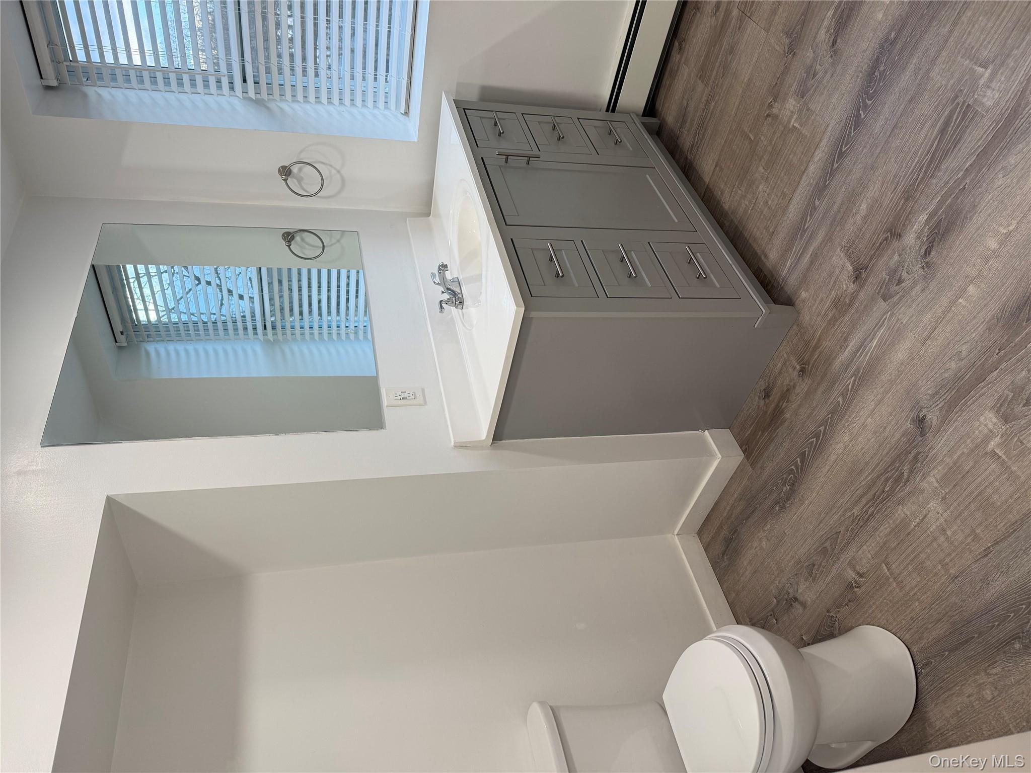 619 Salt Point Turnpike Poughkeepsie, NY 12601 - Photo 12 of 14 a bathroom with a sink and a toilet