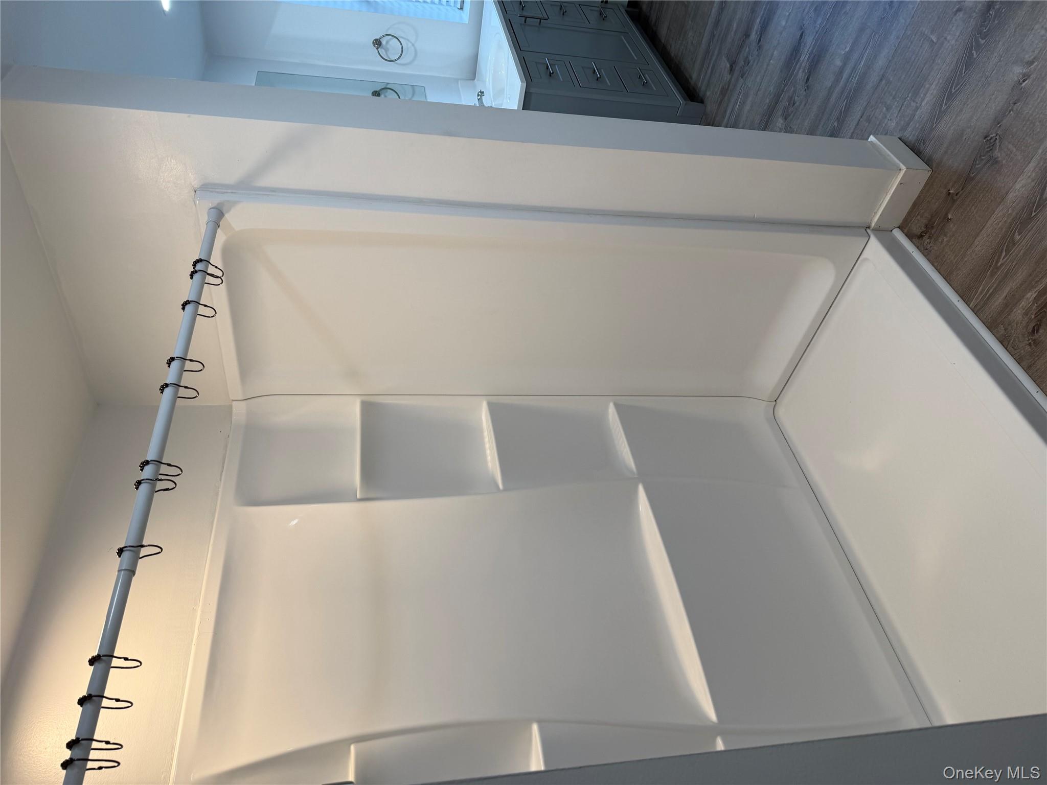 619 Salt Point Turnpike Poughkeepsie, NY 12601 - Photo 13 of 14 a bathroom with a shower and a tub