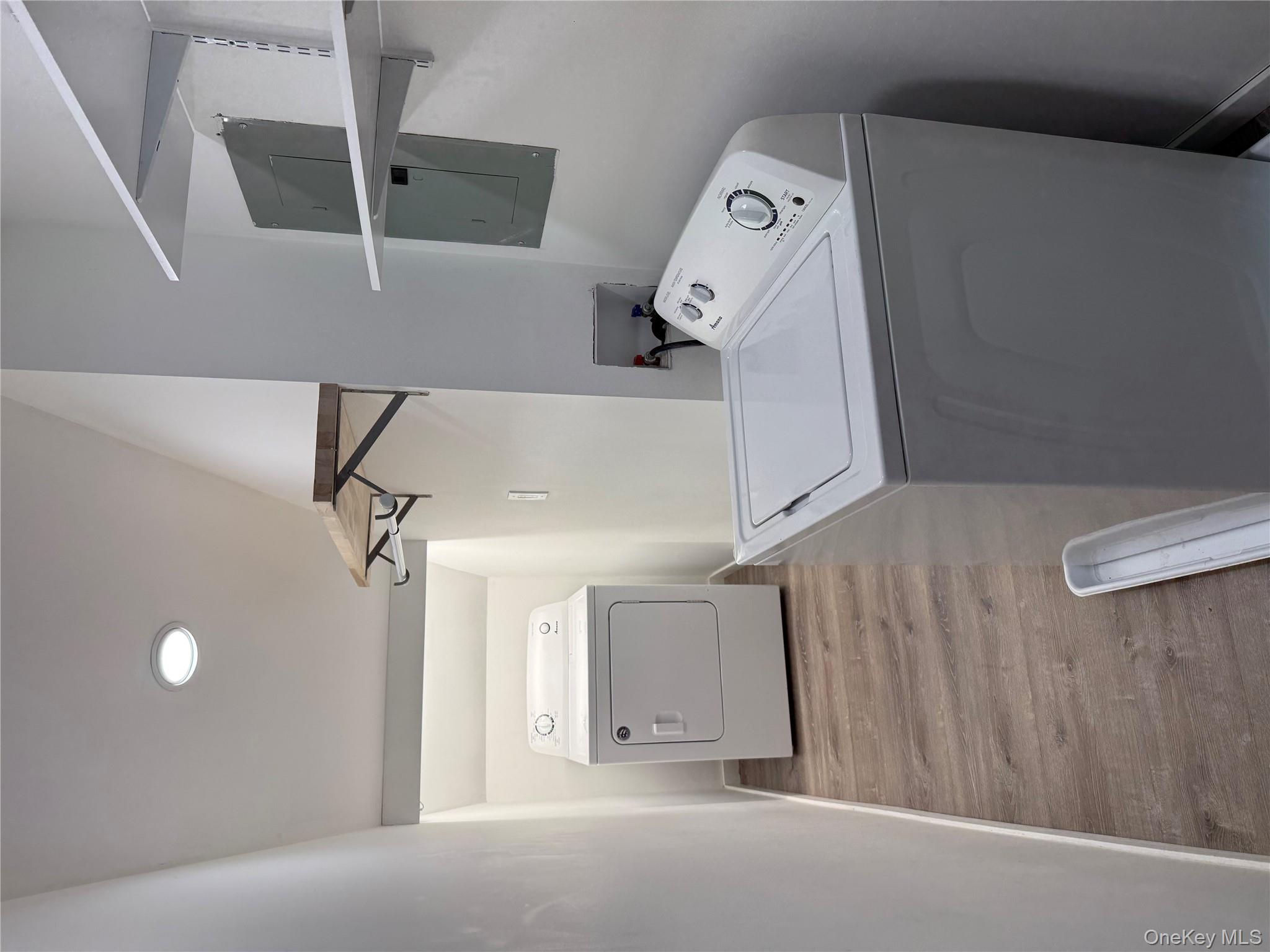 619 Salt Point Turnpike Poughkeepsie, NY 12601 - Photo 14 of 14 a utility room with dryer and washer