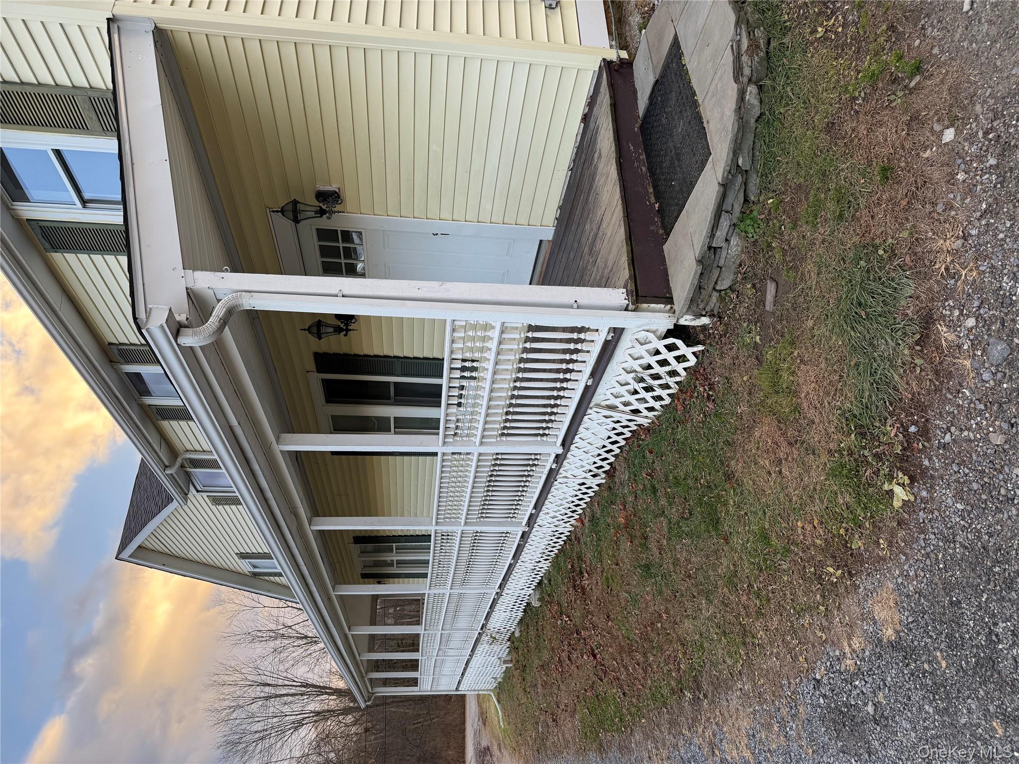 619 Salt Point Turnpike Poughkeepsie, NY 12601 - Photo 2 of 14 a front view of a house with a yard