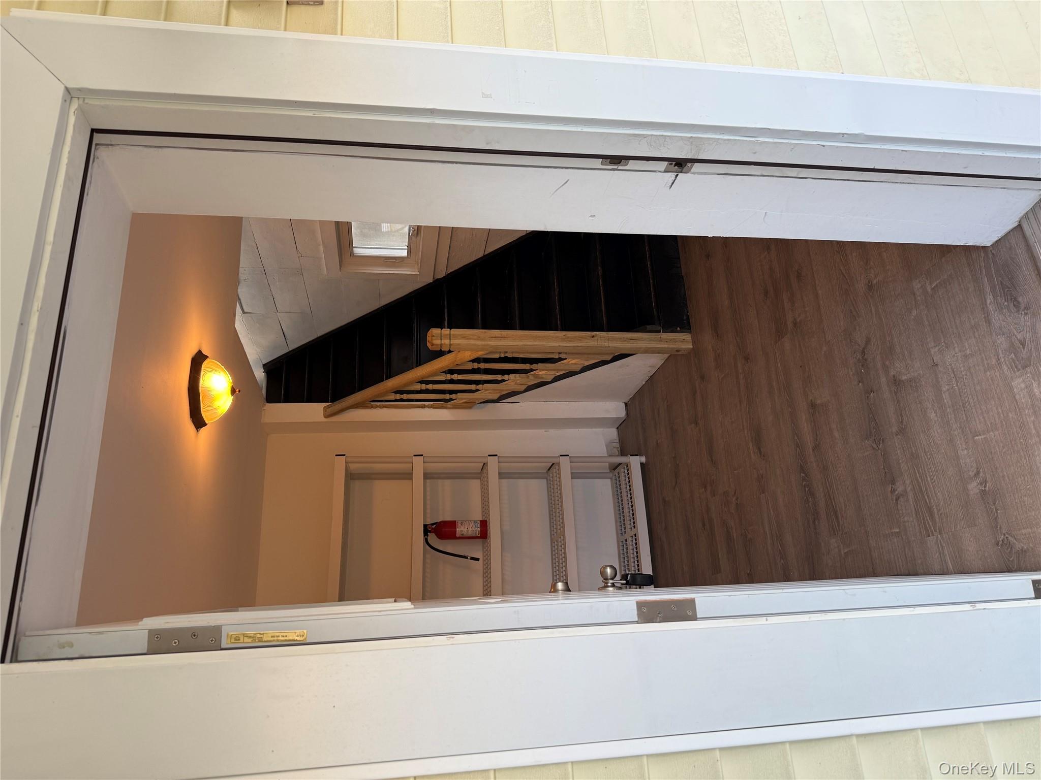 619 Salt Point Turnpike Poughkeepsie, NY 12601 - Photo 3 of 14 a view of entryway and hall with wooden floor