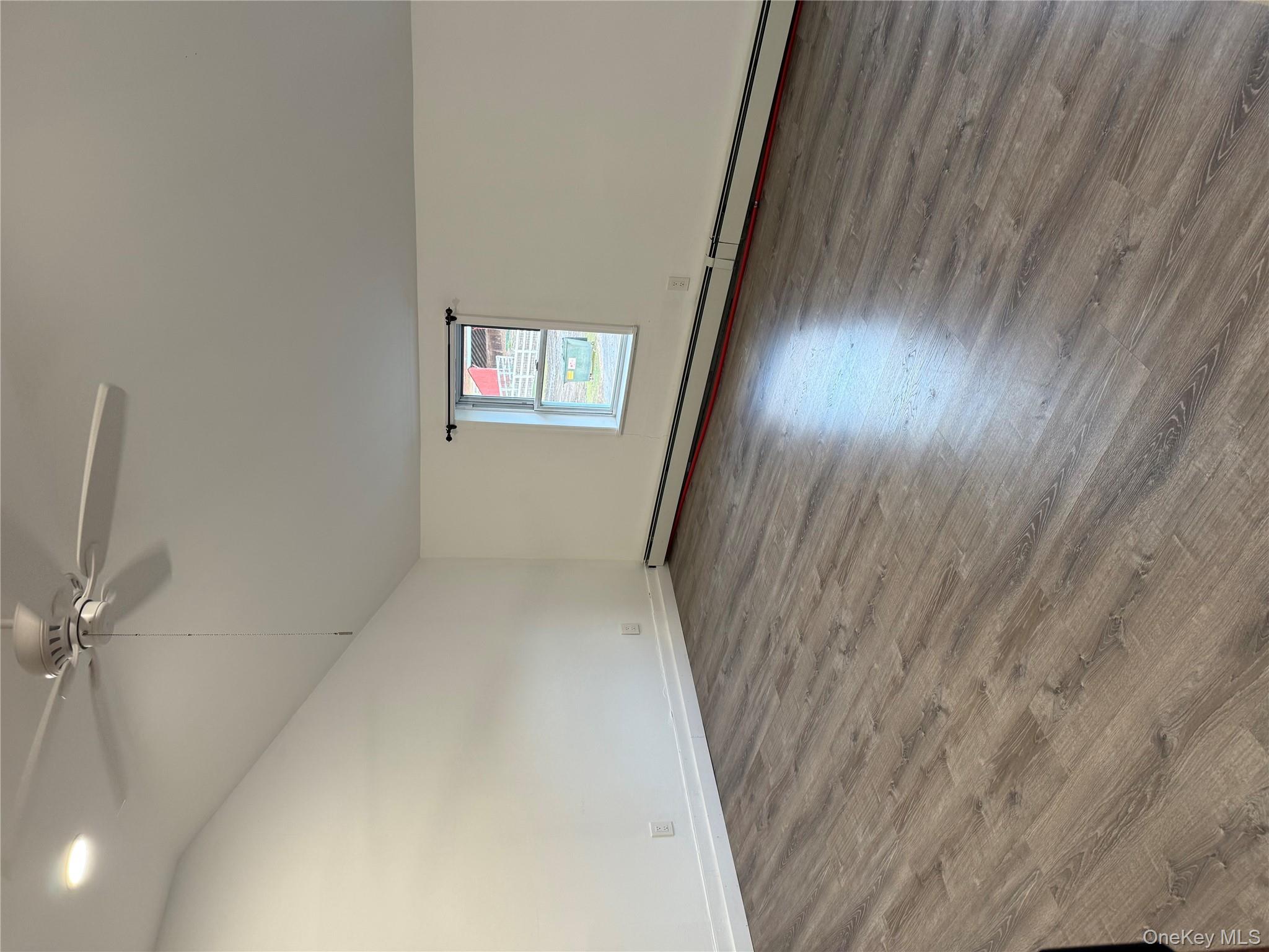 619 Salt Point Turnpike Poughkeepsie, NY 12601 - Photo 6 of 14 a view of a room with wooden floor